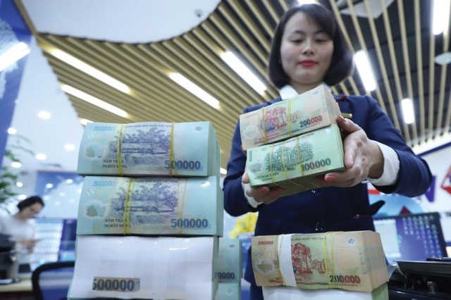 Vì sao Ngân hàng Nhà nước chỉ nới room ngoại lên 49% cho số ít ngân hàng?